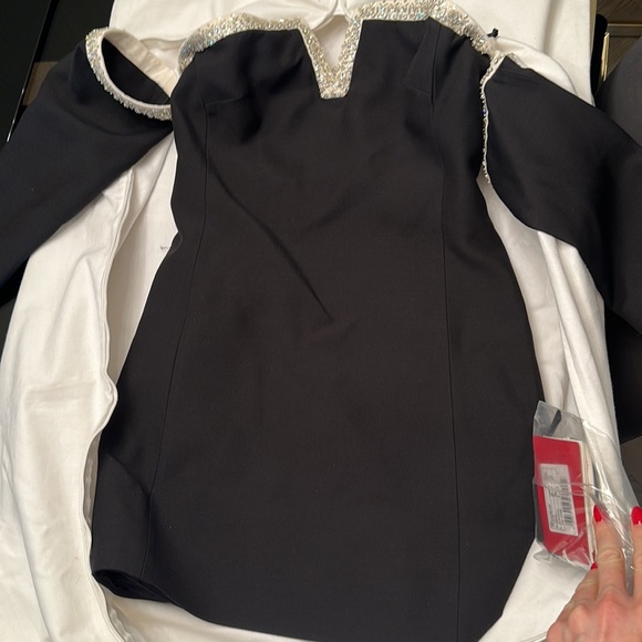 NWT never worn $5900 plus tax!! Still available online for full price. - Picture 6 of 6